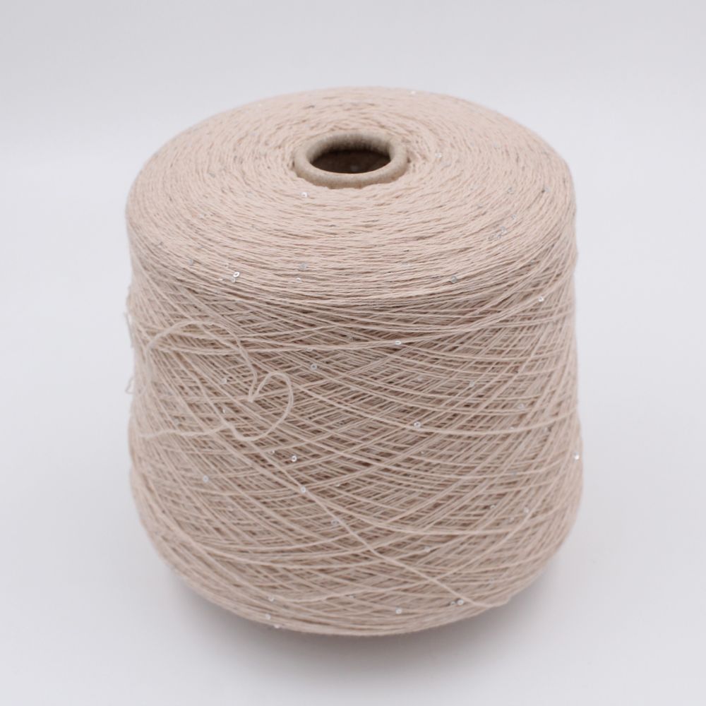 Filato 80% merino extrafine 20% cashmere nm 7000 con paillettes colore beige rocche 790 gr