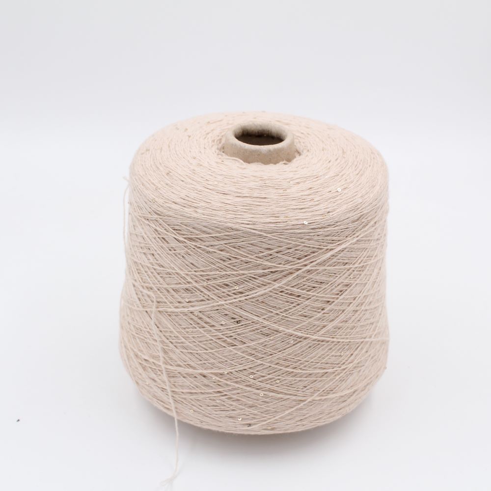 Filato 70% merino extrafine 30% cashmere nm 9000 con paillettes colore beige rocche 400 gr