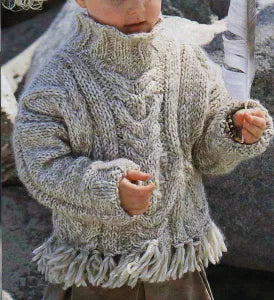 Pull in beige melange con trecce