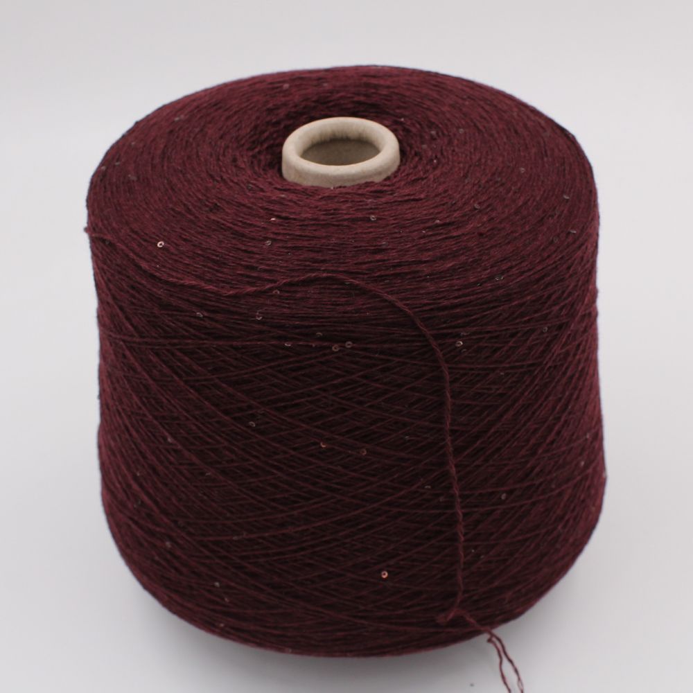 Filato 70% merino extrafine 30% cashmere nm 7000 con paillettes colore bordeaux rocche 480 gr
