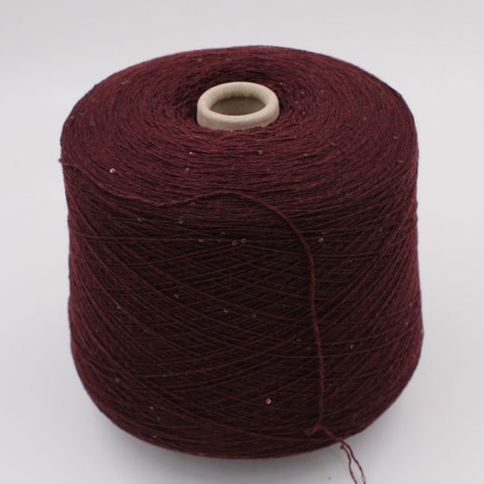 Filato 70% merino extrafine 30% cashmere nm 7000 con paillettes colore bordeaux rocche 480 gr