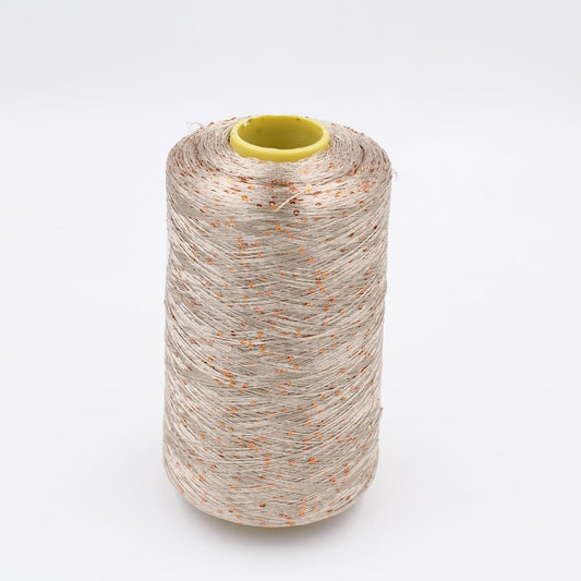 100% polyester yarn, nm. 8000, with sequins beige color cones 620 gr