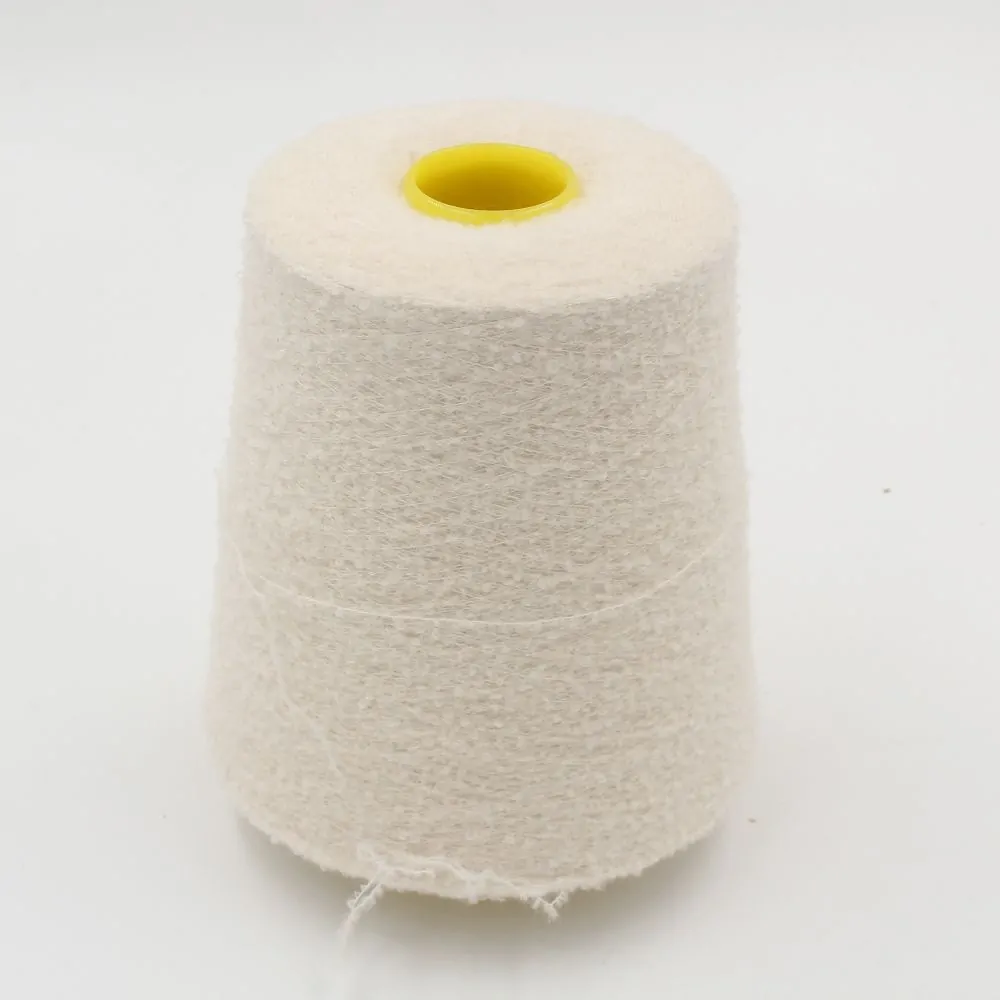 Filato BUCLE' 80% cashmere 20% poliammide nm. 8000 colore bianco naturale rocca 380 gr